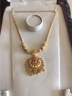 Gold-Tone Floral Pendant Necklace with Ruby and Emerald Accents